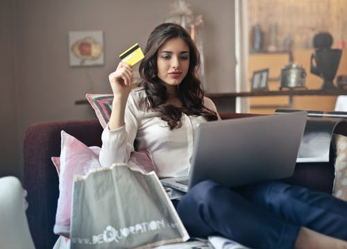 image of woman adjusting her shopping habits to using ecommerce
